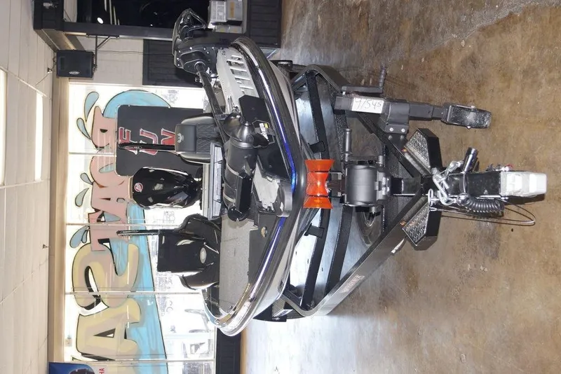 Slide: The Image of 2026 Phoenix 721 ZXL boat on trailer in showroom setting. - 7