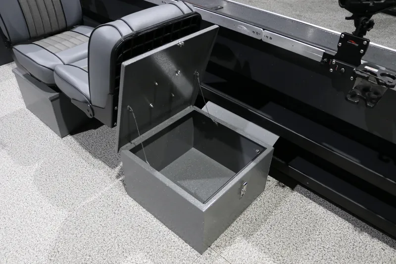 Slide: The Image of Alumaweld Columbia XL 26 boat interior with open storage compartment, 2026 model. - 10