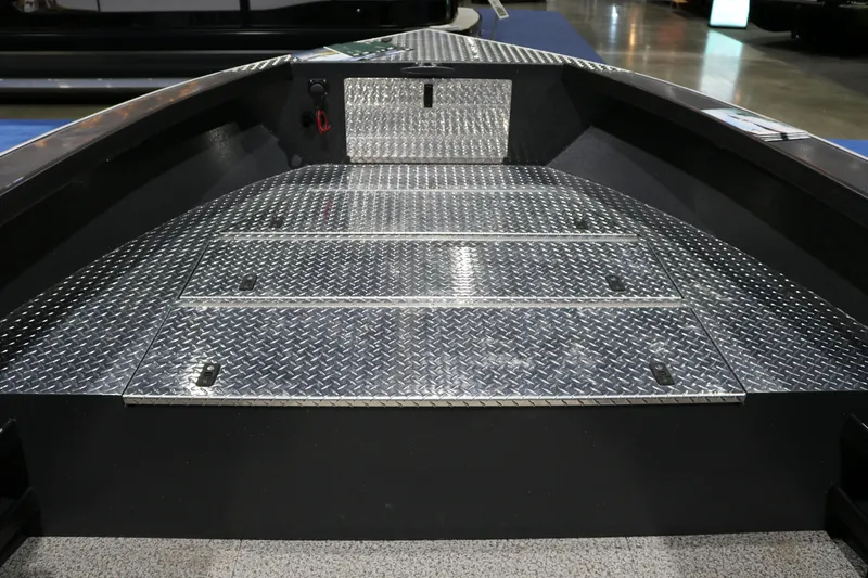 Slide: The Image of Alumaweld Columbia XL 26 boat interior with diamond plate flooring, 2026 model. - 12