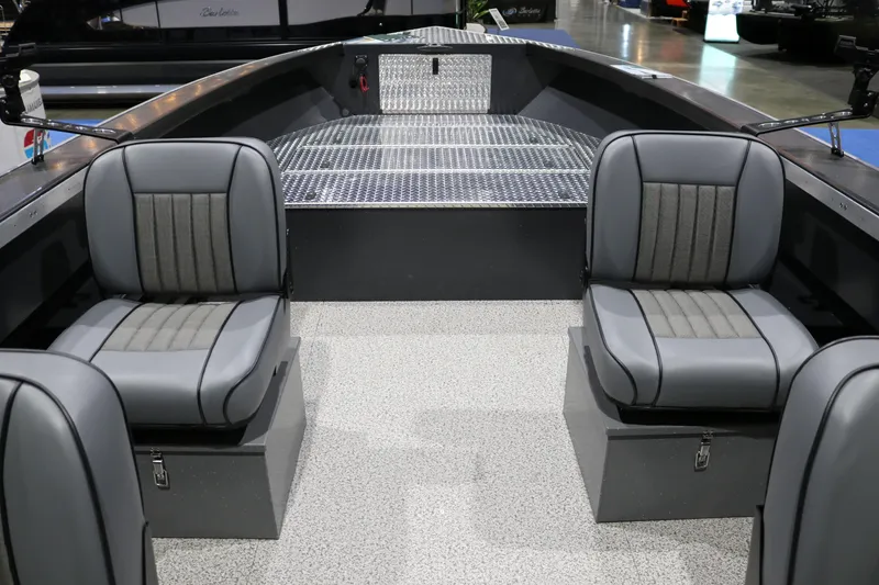 Slide: The Image of 2026 Alumaweld Columbia XL 26 boat interior with gray seating and metal flooring. - 4