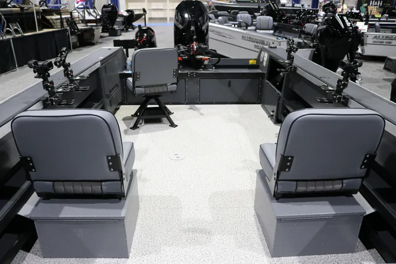 Slide: The Image of 2026 Alumaweld Columbia XL 26 boat interior with seating and fishing rod holders. - 6