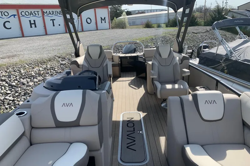 Slide: The Image of 2024 Avalon Catalina Quad Lounge boat interior with luxurious seating and modern design. - 5
