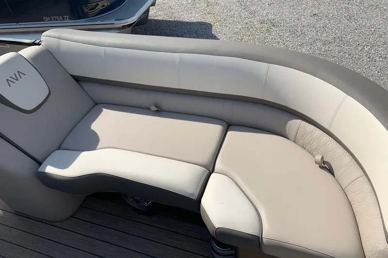 Slide: The Image of 2024 Avalon Catalina Quad Lounge boat seating, featuring elegant beige upholstery and modern design. - 7