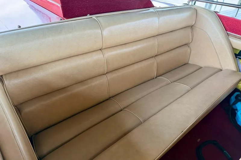 Slide: The Image of Tan leather seating in a 1981 Glaston/Carlson C-512 boat interior. - 20