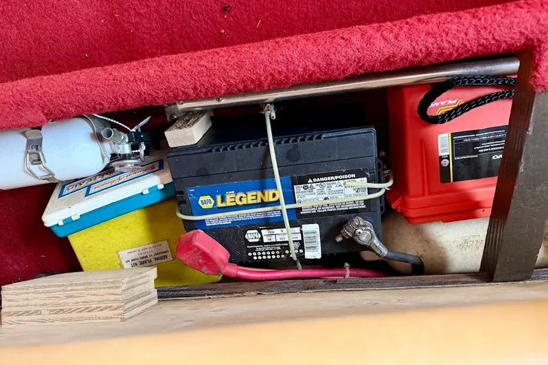 Slide: The Image of Battery compartment of a 1981 Glaston/Carlson C-512 with NAPA Legend battery. - 35