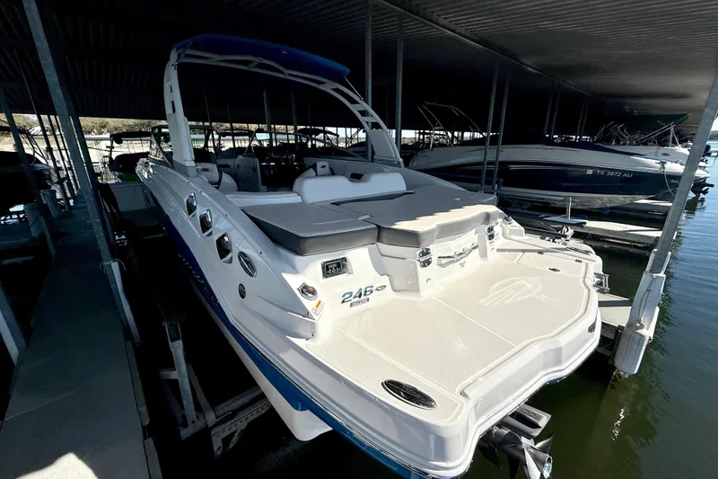 Slide: The Image of 2017 Chaparral 246 SSi boat docked in a covered marina. - 11