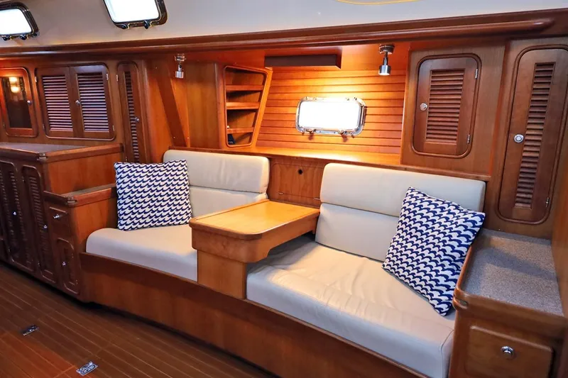 Slide: The Image of Luxurious interior of 2009 Passport Vista 515 Center Cockpit with wooden finish and cozy seating. - 15