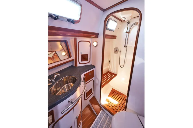 Slide: The Image of Luxurious bathroom in 2009 Passport Vista 515 Center Cockpit yacht with shower and sink. - 20