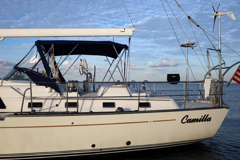 Slide: The Image of Sailboat "Camilla" on water, 2009 Passport Vista 515 Center Cockpit, blue canopy. - 3