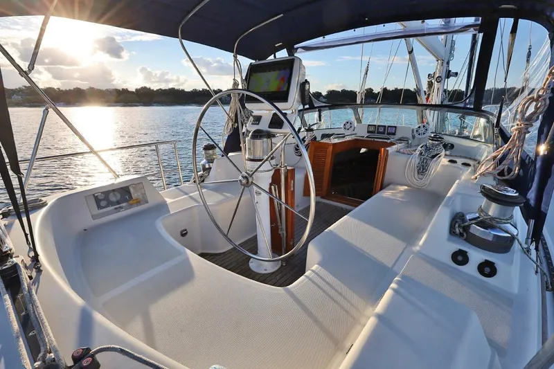 Slide: The Image of Sailing yacht cockpit of 2009 Passport Vista 515, featuring helm and navigation equipment. - 8