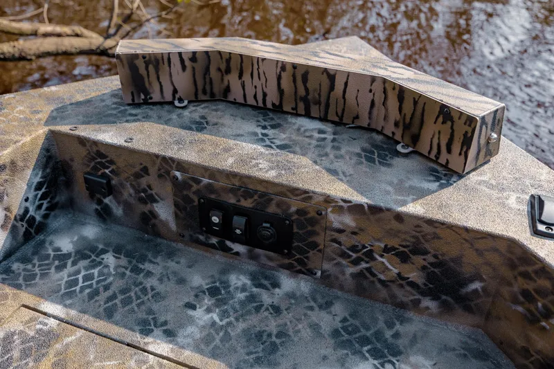 Slide: The Image of Camouflage-patterned deck of 2026 Excel 183 Tomahawk boat with control panel. - 25