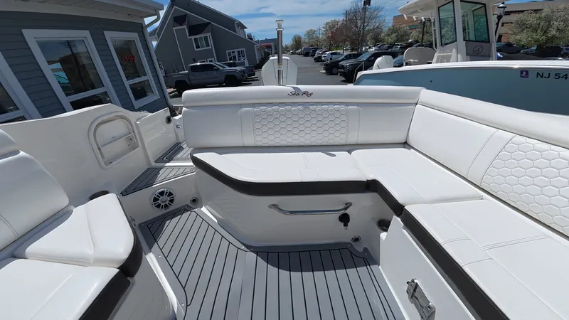 Slide: The Image of Interior of 2020 Sea Ray SDX 270 Outboard with white seating. - 11
