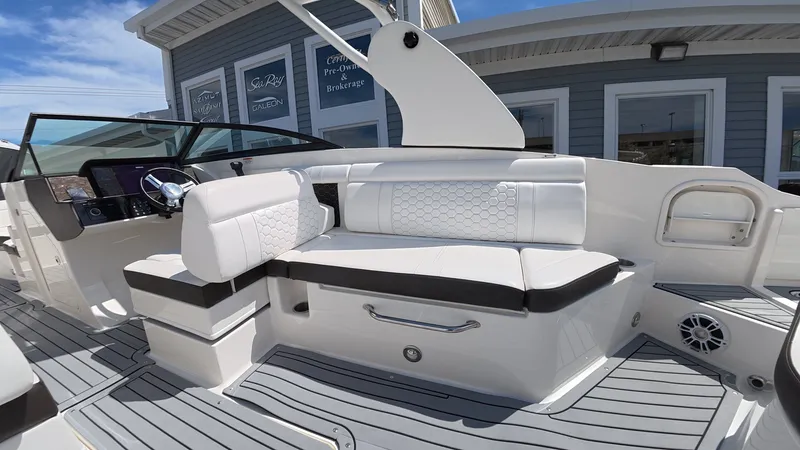 Slide: The Image of Interior of a 2020 Sea Ray SDX 270 Outboard with luxurious seating. - 14