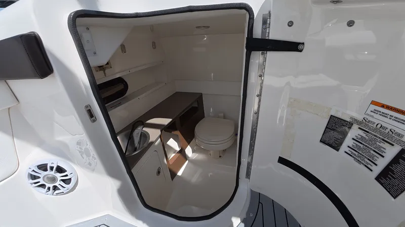 Slide: The Image of Interior of 2020 Sea Ray SDX 270 Outboard with toilet. - 22