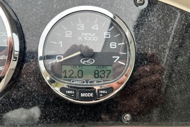 Slide: The Image of Gauge display on 2008 Sea Ray 240 Sundancer showing 12 volts and 837 hours. - 26