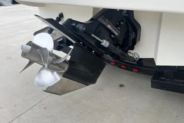Slide: The Image of Propeller and outdrive of 2008 Sea Ray 240 Sundancer boat on concrete surface. - 3