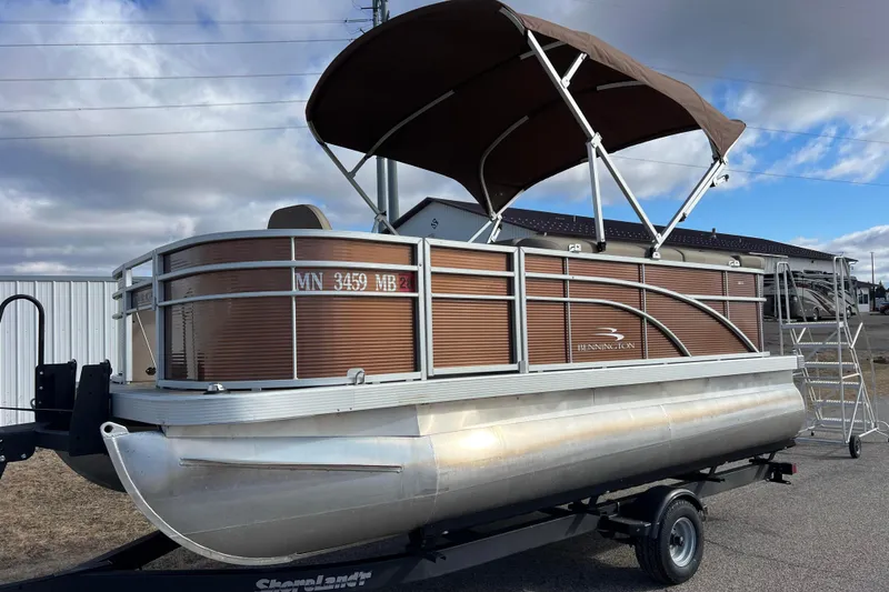 The Image of 2021 Bennington 168 Fish Cruise pontoon boat with canopy on trailer. - 0