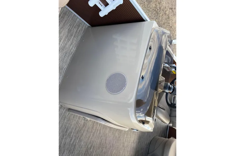 Slide: The Image of 2021 Bennington 168 FISH CRUISE boat console with steering wheel and speaker. - 13