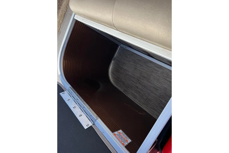 Slide: The Image of Storage compartment of a 2021 Bennington 168 FISH CRUISE boat, open and empty. - 19