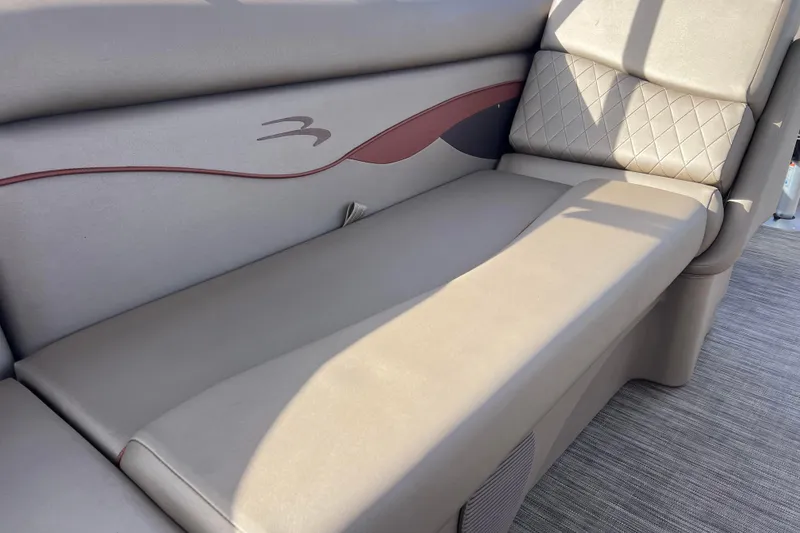 Slide: The Image of 2021 Bennington 168 FISH CRUISE boat interior seating with elegant upholstery design. - 22