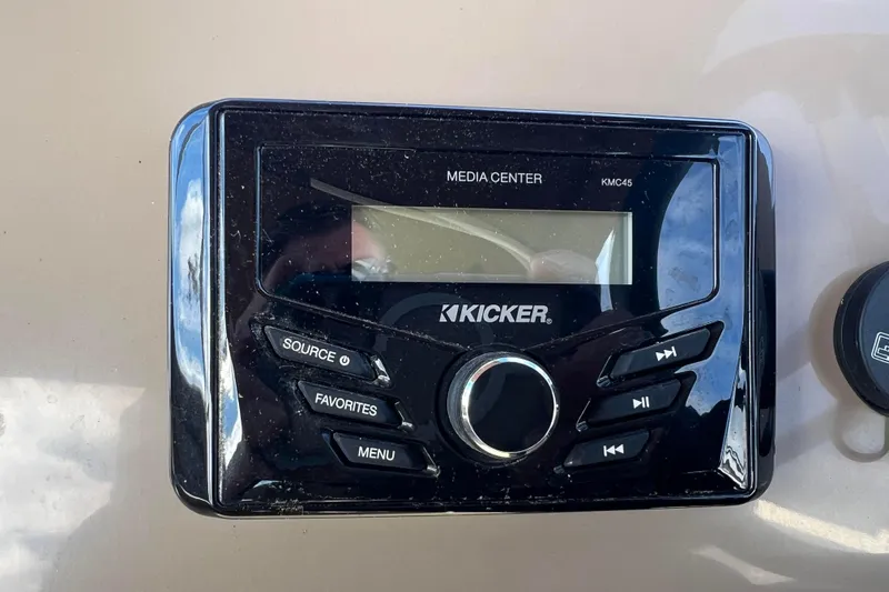 Slide: The Image of Kicker media center on 2021 Bennington 168 FISH CRUISE boat dashboard. - 25