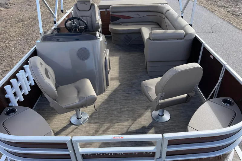 Slide: The Image of 2021 Bennington 168 FISH CRUISE pontoon boat interior with seating and helm. - 3