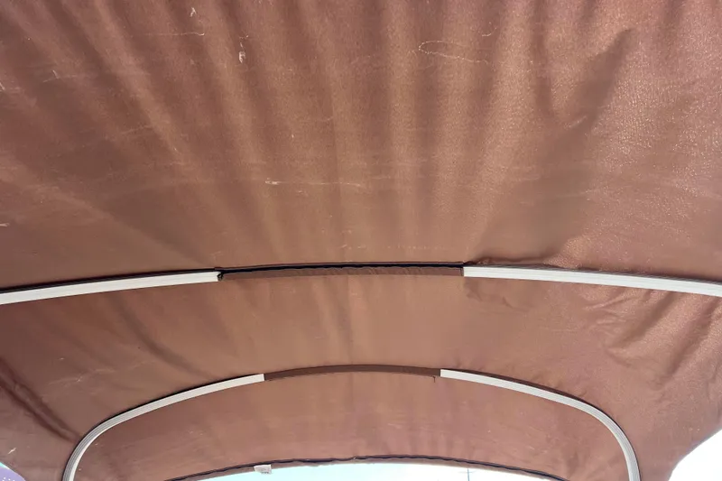 Slide: The Image of Brown canopy of a 2021 Bennington 168 FISH CRUISE boat. - 35