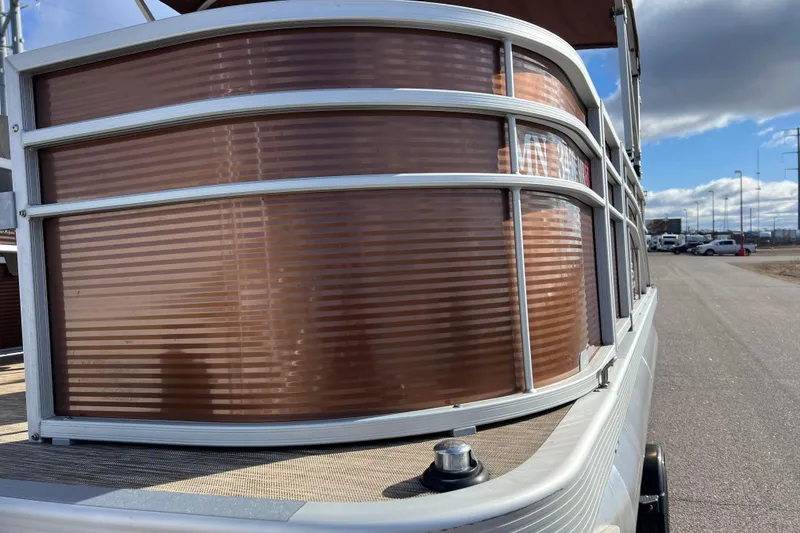 Slide: The Image of 2021 Bennington 168 FISH CRUISE pontoon boat, side view with brown paneling. - 38