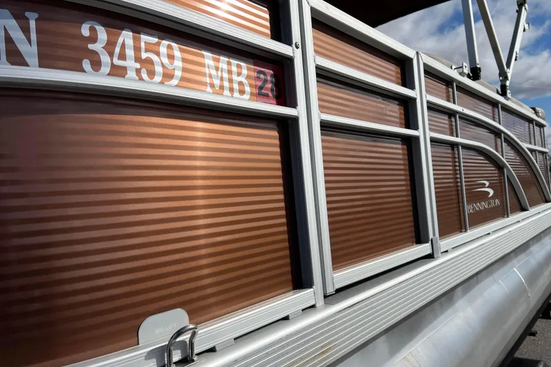 Slide: The Image of 2021 Bennington 168 Fish Cruise pontoon boat with registration number, side view. - 39