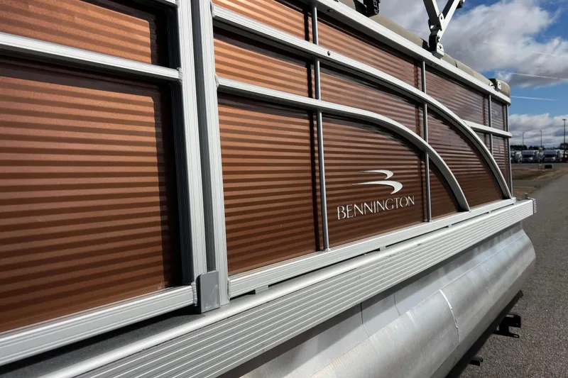 Slide: The Image of 2021 Bennington 168 FISH CRUISE pontoon boat with brown paneling and silver trim. - 40