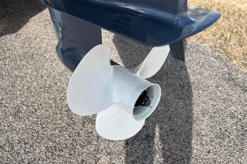Slide: The Image of Close-up of a 2021 Bennington 168 FISH CRUISE boat propeller on asphalt. - 45