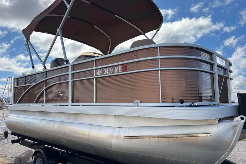 Slide: The Image of 2021 Bennington 168 FISH CRUISE pontoon boat with canopy on trailer. - 5