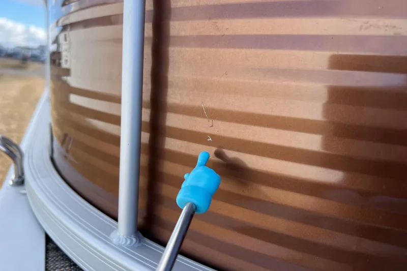 Slide: The Image of Close-up of a 2021 Bennington 168 Fish Cruise boat with a small scratch. - 50