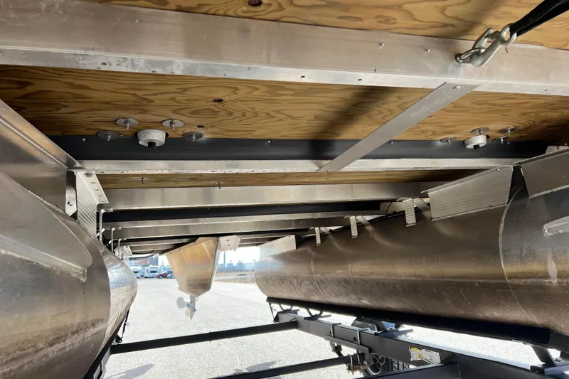 Slide: The Image of Underneath view of a 2021 Bennington 168 Fish Cruise pontoon boat on a trailer. - 53