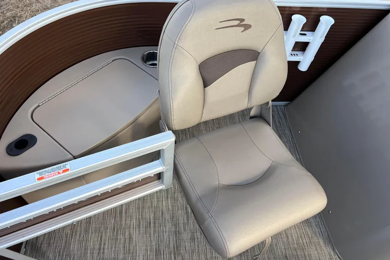 Slide: The Image of 2021 Bennington 168 FISH CRUISE boat seat with rod holders and storage compartment. - 8