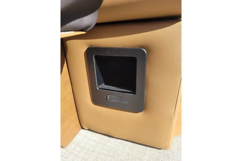 Slide: The Image of 2024 Avalon Catalina 2585 RL interior detail with tan upholstery and black panel. - 13