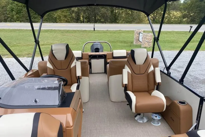 Slide: The Image of 2024 Avalon Catalina 2585 RL boat interior with luxurious seating and modern design. - 5