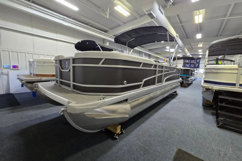 The Image of 2026 Princecraft Vectra 23 L pontoon boat displayed indoors. - 0