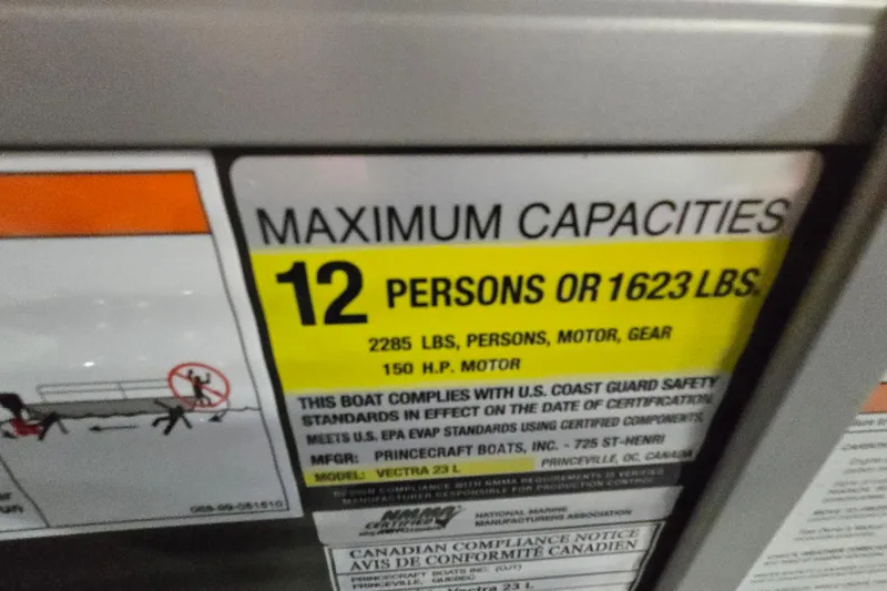 Slide: The Image of Maximum capacity label for Princecraft Vectra 23 L, 2026 model, 12 persons or 1623 lbs. - 11