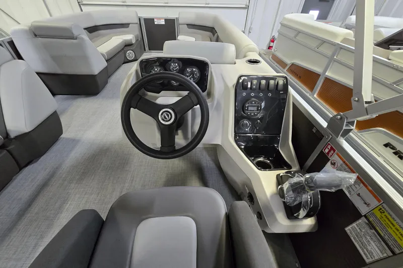 Slide: The Image of Interior view of 2026 Princecraft Vectra 23 L pontoon boat cockpit and seating area. - 5