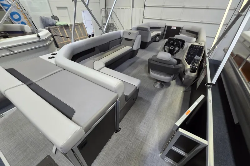 Slide: The Image of 2026 Princecraft Vectra 23 L pontoon boat interior with spacious seating and modern helm. - 6