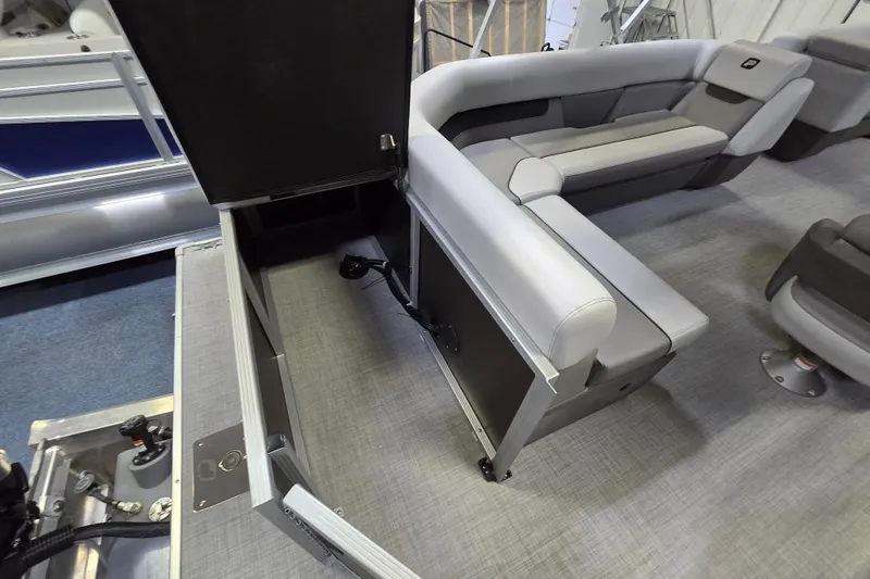 Slide: The Image of 2026 Princecraft Vectra 23 L pontoon boat interior with gray seating and storage compartment. - 7