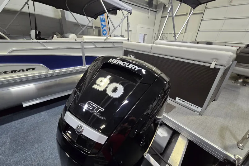 Slide: The Image of 2026 Princecraft Vectra 23 L pontoon boat with Mercury 90 HP outboard motor. - 9