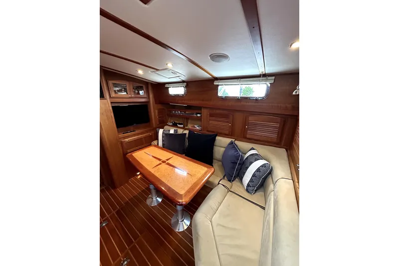 Slide: The Image of Luxurious interior of 2006 Sabre 38 Hard Top Express yacht with elegant wood finish. - 13