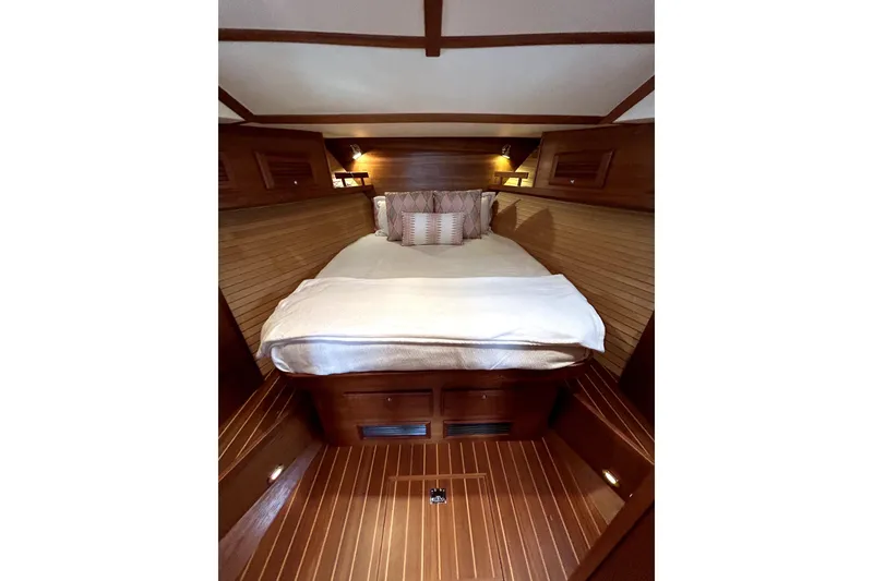 Slide: The Image of Cozy cabin interior of 2006 Sabre 38 Hard Top Express yacht with wooden finish. - 15
