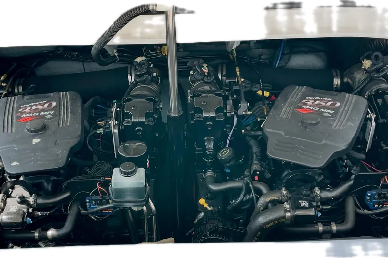 Slide: The Image of Twin MerCruiser 350 MAG MPI engines in a 2003 Sea Ray 290 Bowrider boat. - 37