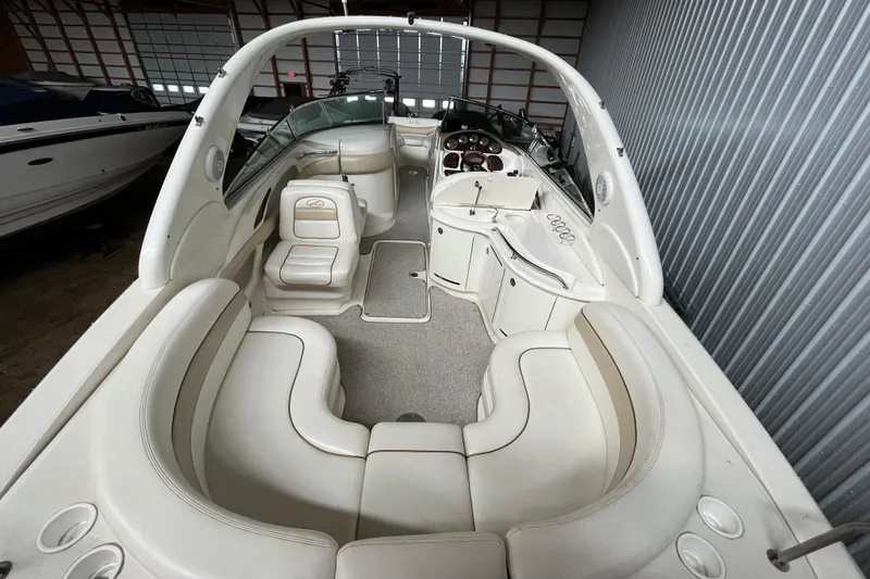 Slide: The Image of 2003 Sea Ray 290 Bowrider interior with spacious seating and sleek design. - 5