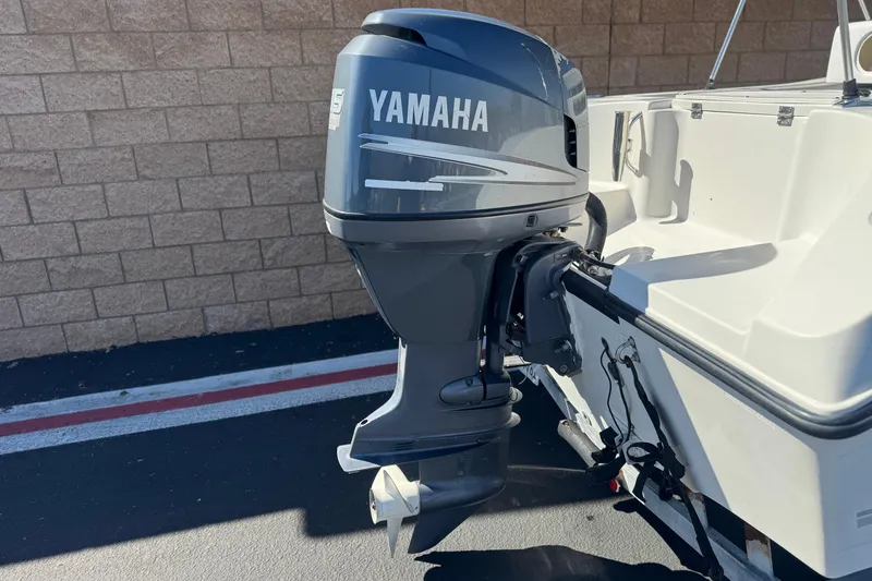 Slide: The Image of 2006 Seaswirl Striper 1851 Center Console with Yamaha outboard motor. - 6