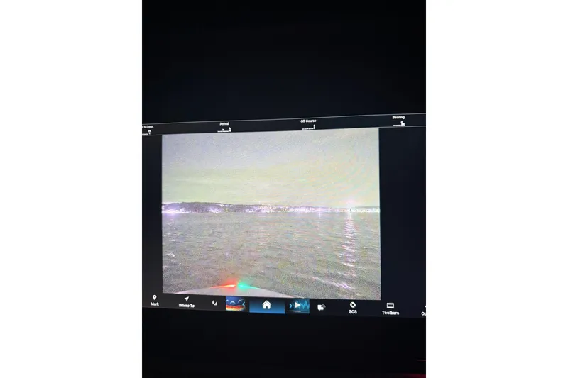 Slide: The Image of Nighttime navigation screen on a 2026 Grady-White Freedom 325 boat. - 6