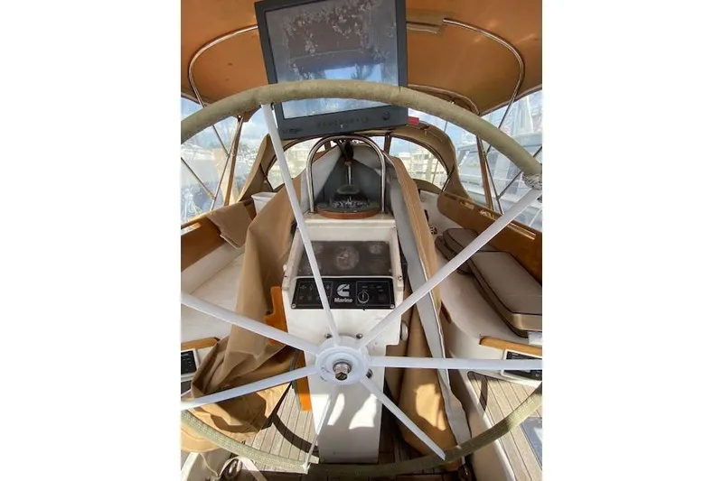 Slide: The Image of Cockpit of 1990 Little Harbor Sloop 58' with steering wheel and navigation equipment. - 41